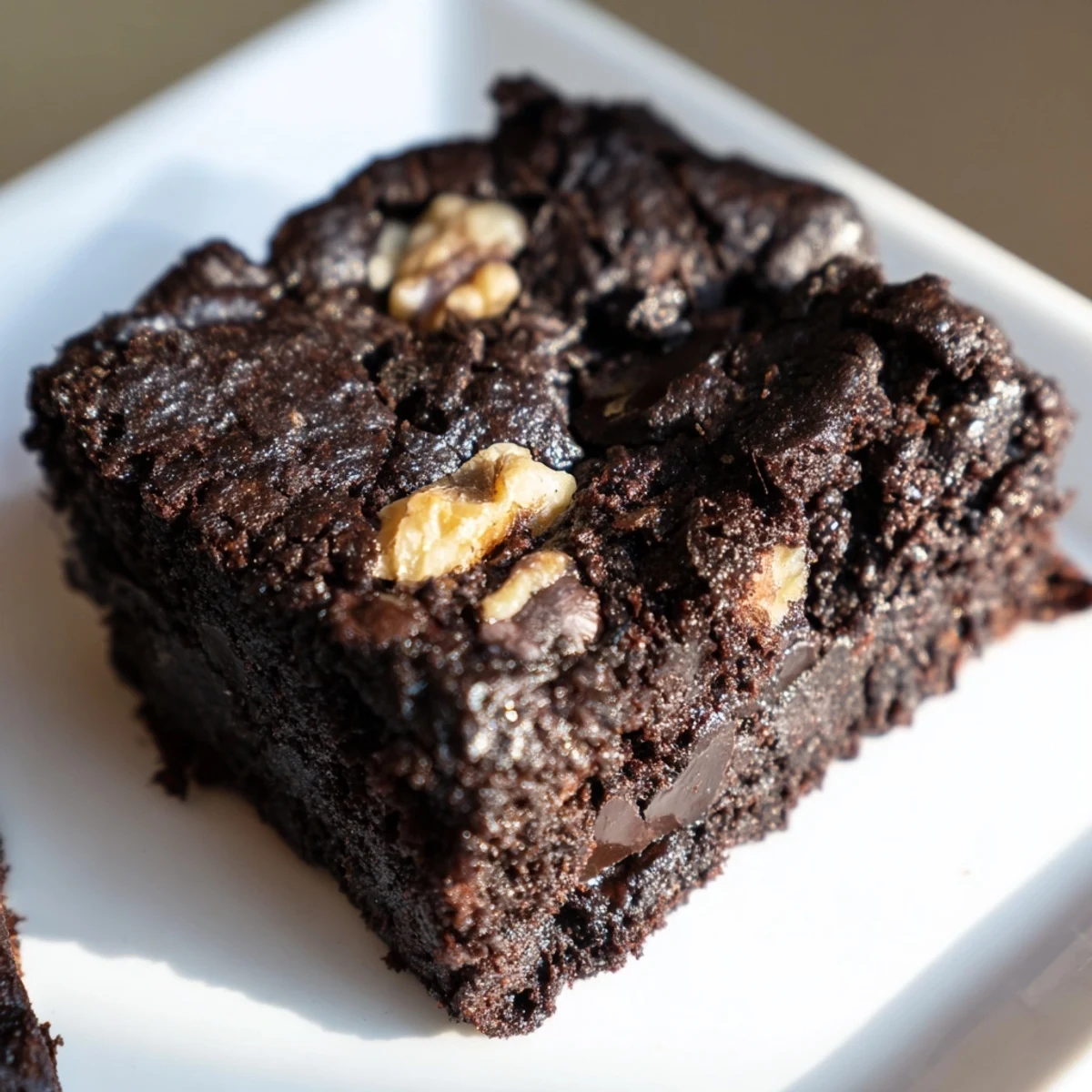 Imagine the aroma: a plate of warm Gluten-Free Almond Flour Brownies, a delicious treat perfect for sharing or savoring alone.