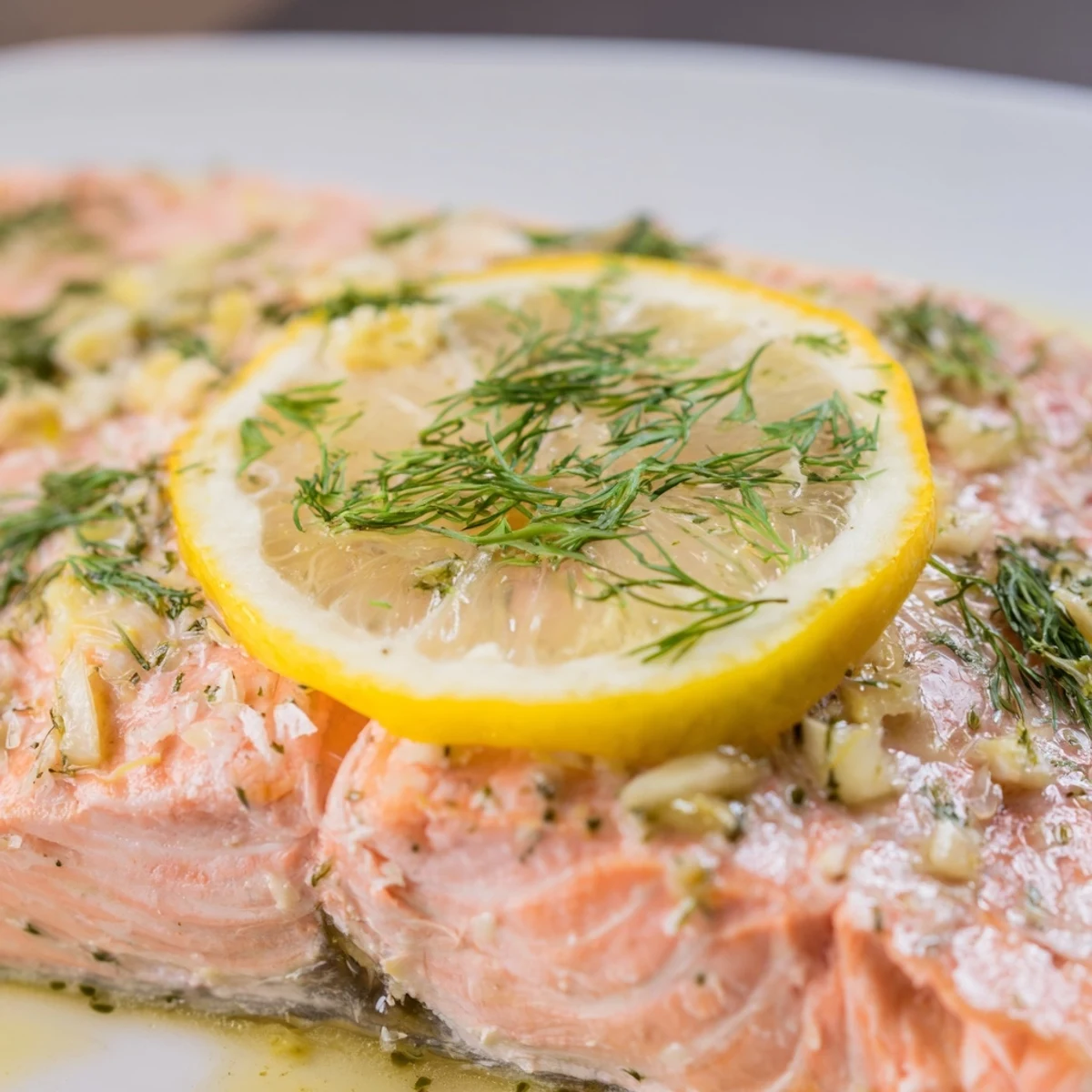 A flaky and juicy baked salmon fillet served with roasted vegetables for a healthy dinner.