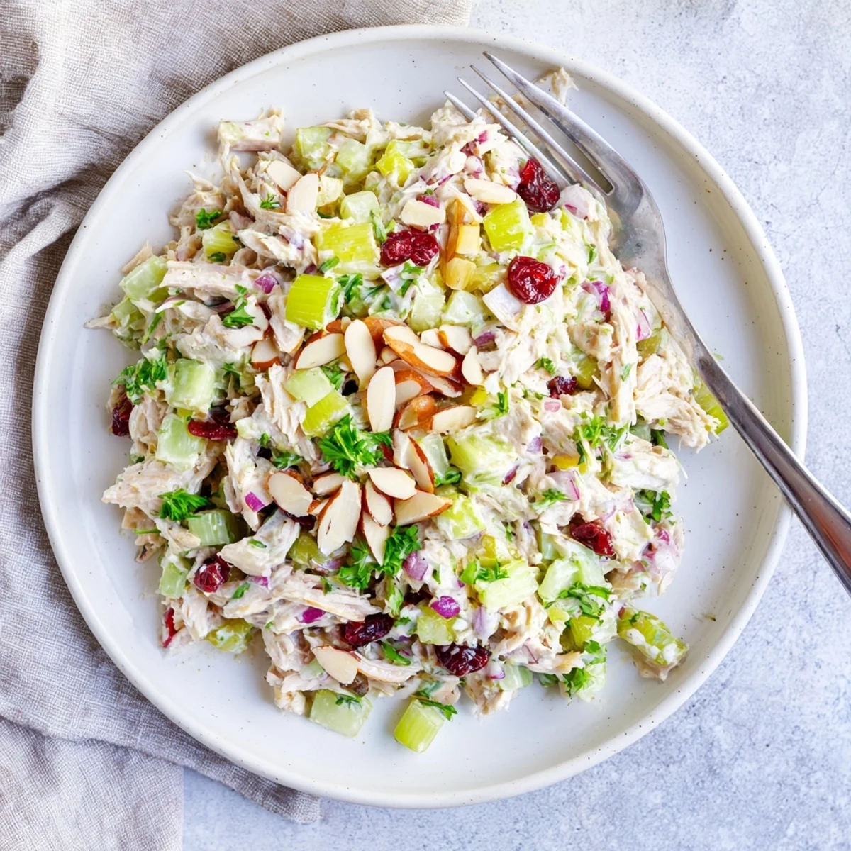 Creamy Greek yogurt rotisserie chicken salad with crisp red bell pepper and fresh parsley
