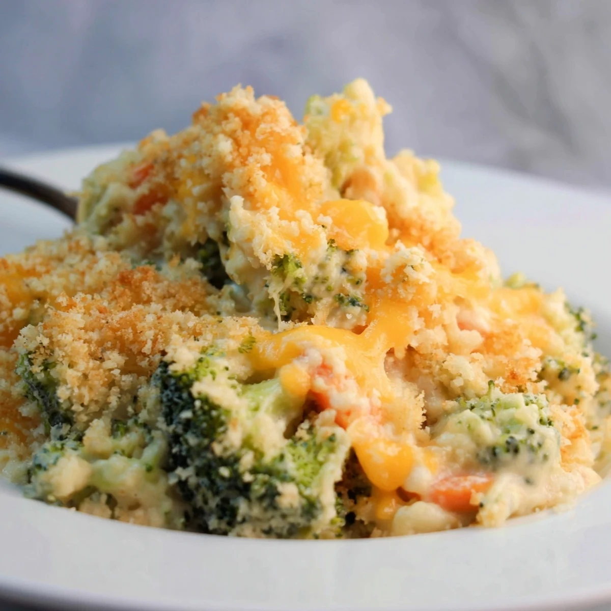 Tender florets and sweet carrots in Cheese Bake Broccoli Carrots with crisp topping.