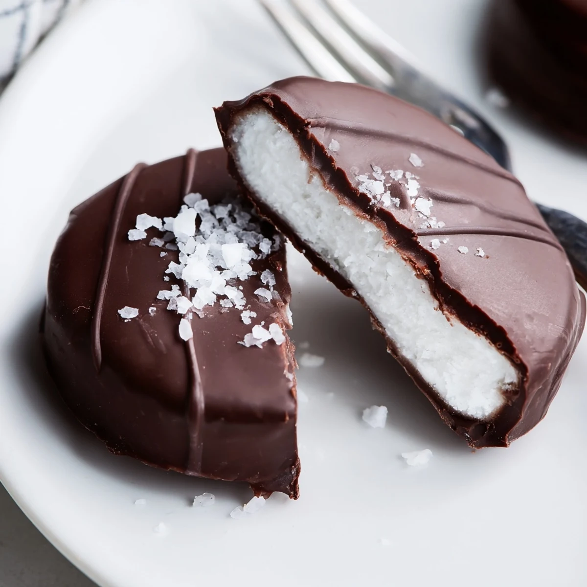Homemade Peppermint Patties with creamy mint center and rich chocolate sheen.